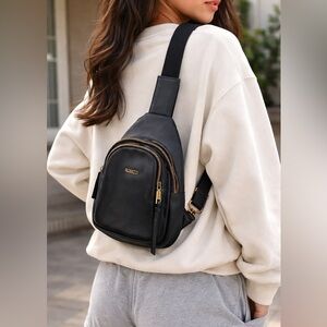 Rosetti Black Faux Leather Sling Crossbody Backpack Gold Hardware Compact Purse